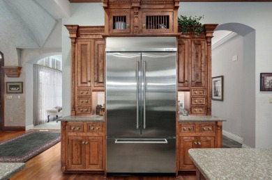 Stunning custom estate on the 1st hole fairway of the on Highland Springs Country Club in Missouri - for sale on GolfHomes.com, golf home, golf lot