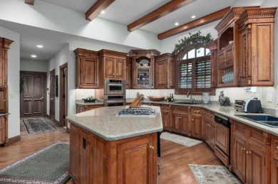 Stunning custom estate on the 1st hole fairway of the on Highland Springs Country Club in Missouri - for sale on GolfHomes.com, golf home, golf lot