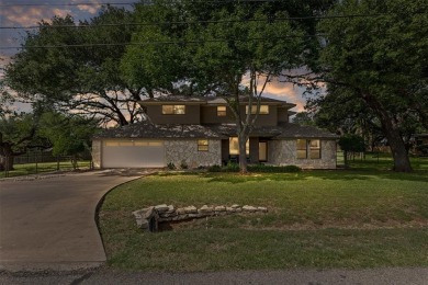 Welcome to this beautifully updated home with standout curb on De Cordova Bend Country Club in Texas - for sale on GolfHomes.com, golf home, golf lot