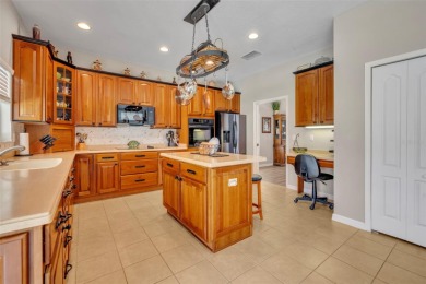 Beautifully situated within the gated North Shore at Lake Hart on North Shore Golf Club in Florida - for sale on GolfHomes.com, golf home, golf lot