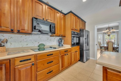 Beautifully situated within the gated North Shore at Lake Hart on North Shore Golf Club in Florida - for sale on GolfHomes.com, golf home, golf lot