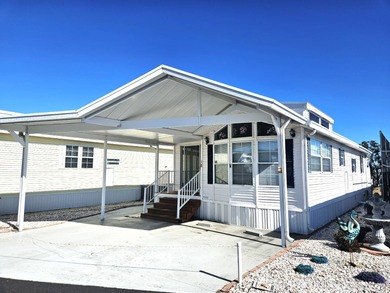 This beautiful property is located in the 55+ Mockingbird on Deer Creek RV Golf Resort in Florida - for sale on GolfHomes.com, golf home, golf lot