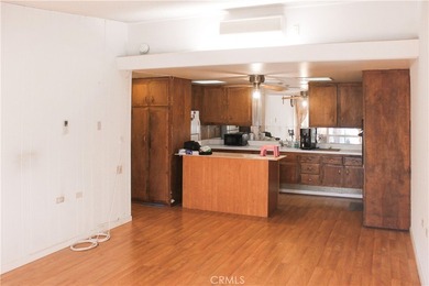 Located in the highly sought-after 55+ gated community of on Leisure World Seal Beach Golf Course in California - for sale on GolfHomes.com, golf home, golf lot