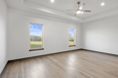 Experience refined living in this beautifully built 2022 home on Ram Rock Golf Course in Texas - for sale on GolfHomes.com, golf home, golf lot