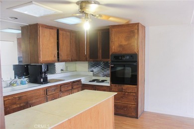 Located in the highly sought-after 55+ gated community of on Leisure World Seal Beach Golf Course in California - for sale on GolfHomes.com, golf home, golf lot