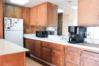 Located in the highly sought-after 55+ gated community of on Leisure World Seal Beach Golf Course in California - for sale on GolfHomes.com, golf home, golf lot