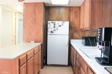 Located in the highly sought-after 55+ gated community of on Leisure World Seal Beach Golf Course in California - for sale on GolfHomes.com, golf home, golf lot