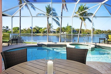 It's the VIEW! Sweeping water views will greet you when you walk on The Dunes Golf and Tennis Club in Florida - for sale on GolfHomes.com, golf home, golf lot