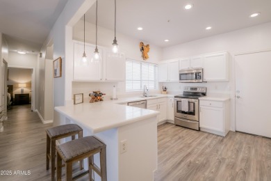 Discover this stunning townhome in the highly sought-after on Palm Valley Golf Club  in Arizona - for sale on GolfHomes.com, golf home, golf lot