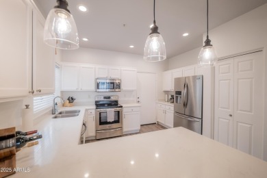 Discover this stunning townhome in the highly sought-after on Palm Valley Golf Club  in Arizona - for sale on GolfHomes.com, golf home, golf lot