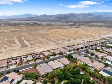 Located in the highly acclaimed Mountain Falls Golf Course on Mountain Falls Golf Course in Nevada - for sale on GolfHomes.com, golf home, golf lot