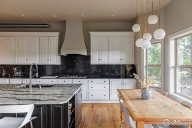 This 5-bed, 5-bath home in exclusive Indian Peaks backs directly on Indian Peaks Golf Course in Colorado - for sale on GolfHomes.com, golf home, golf lot