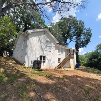 Discover 1825 Willis Mill Rd SW**, a beautifully renovated brick on John A. White Golf Course in Georgia - for sale on GolfHomes.com, golf home, golf lot