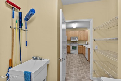 Discover your slice of paradise in this stunning 3 bedroom, 2 on Crow Creek Golf Club in North Carolina - for sale on GolfHomes.com, golf home, golf lot