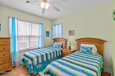 Discover your slice of paradise in this stunning 3 bedroom, 2 on Crow Creek Golf Club in North Carolina - for sale on GolfHomes.com, golf home, golf lot