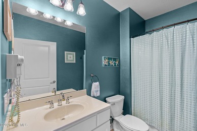 Discover your slice of paradise in this stunning 3 bedroom, 2 on Crow Creek Golf Club in North Carolina - for sale on GolfHomes.com, golf home, golf lot