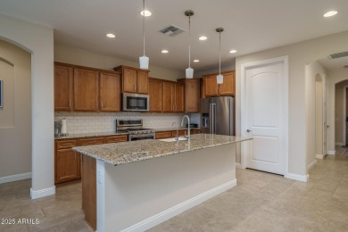 Sitting on a premium homesite with Wagner Wash bordering the on Copper Canyon Golf Club in Arizona - for sale on GolfHomes.com, golf home, golf lot