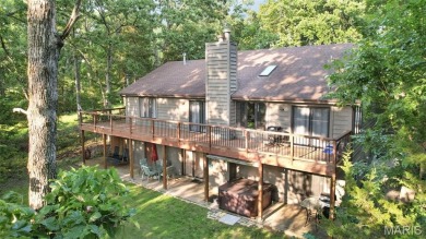 Tucked at the end of a quiet cul-de-sac, 877 Red Fox Drive on Innsbrook Resort Golf Course in Missouri - for sale on GolfHomes.com, golf home, golf lot