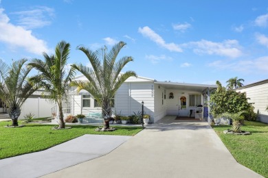 This beautifully updated 2-bedroom, 2-bathroom split-floor plan on Heritage Ridge Golf Club in Florida - for sale on GolfHomes.com, golf home, golf lot