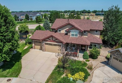Beautiful custom built 5-bedroom, 4-bath two-story home tucked on Pelican Lakes Golf and Country Club in Colorado - for sale on GolfHomes.com, golf home, golf lot