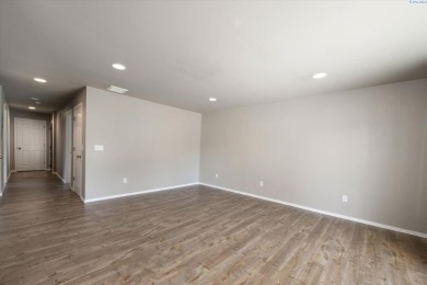 MLS# 284092 Nicely remodeled Co-op condo a short walk away from on Tri-City Country Club in Washington - for sale on GolfHomes.com, golf home, golf lot