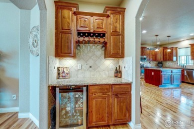 Beautiful custom built 5-bedroom, 4-bath two-story home tucked on Pelican Lakes Golf and Country Club in Colorado - for sale on GolfHomes.com, golf home, golf lot
