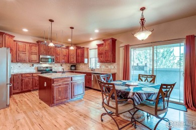 Beautiful custom built 5-bedroom, 4-bath two-story home tucked on Pelican Lakes Golf and Country Club in Colorado - for sale on GolfHomes.com, golf home, golf lot
