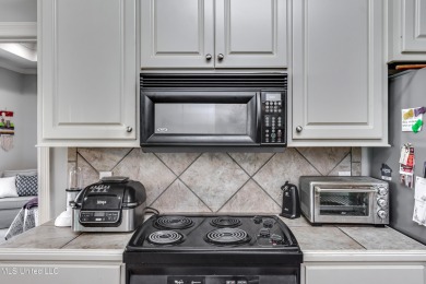 Welcome Home to this 3 bed, 2 bath home.  It offers an open on Lake Caroline Golf Club in Mississippi - for sale on GolfHomes.com, golf home, golf lot