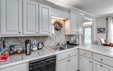 Welcome Home to this 3 bed, 2 bath home.  It offers an open on Lake Caroline Golf Club in Mississippi - for sale on GolfHomes.com, golf home, golf lot