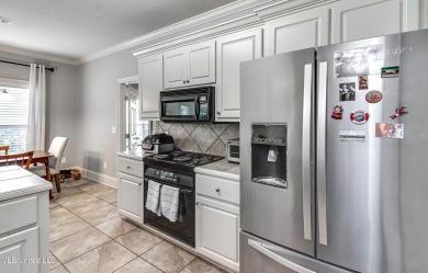 Welcome Home to this 3 bed, 2 bath home.  It offers an open on Lake Caroline Golf Club in Mississippi - for sale on GolfHomes.com, golf home, golf lot