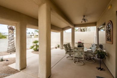 Take a look at this stunning RV garage home located in a private on London Bridge Golf Course in Arizona - for sale on GolfHomes.com, golf home, golf lot