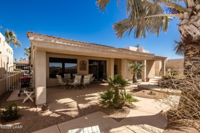 Take a look at this stunning RV garage home located in a private on London Bridge Golf Course in Arizona - for sale on GolfHomes.com, golf home, golf lot