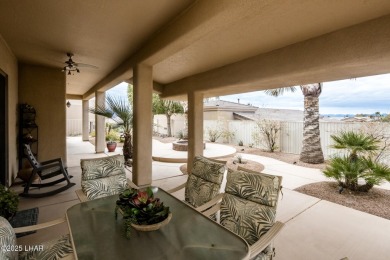 Take a look at this stunning RV garage home located in a private on London Bridge Golf Course in Arizona - for sale on GolfHomes.com, golf home, golf lot