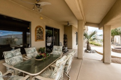 Take a look at this stunning RV garage home located in a private on London Bridge Golf Course in Arizona - for sale on GolfHomes.com, golf home, golf lot