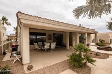 Take a look at this stunning RV garage home located in a private on London Bridge Golf Course in Arizona - for sale on GolfHomes.com, golf home, golf lot