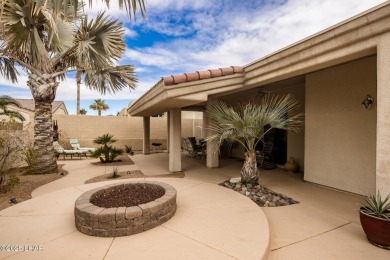 Take a look at this stunning RV garage home located in a private on London Bridge Golf Course in Arizona - for sale on GolfHomes.com, golf home, golf lot