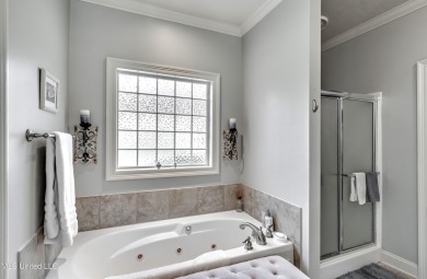 Welcome Home to this 3 bed, 2 bath home.  It offers an open on Lake Caroline Golf Club in Mississippi - for sale on GolfHomes.com, golf home, golf lot