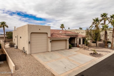 Take a look at this stunning RV garage home located in a private on London Bridge Golf Course in Arizona - for sale on GolfHomes.com, golf home, golf lot