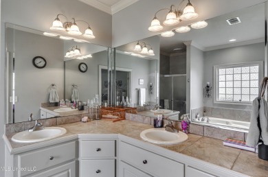 Welcome Home to this 3 bed, 2 bath home.  It offers an open on Lake Caroline Golf Club in Mississippi - for sale on GolfHomes.com, golf home, golf lot