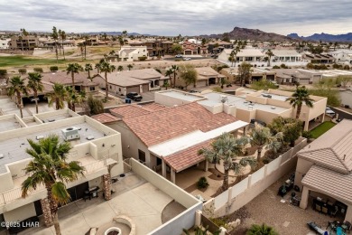 Take a look at this stunning RV garage home located in a private on London Bridge Golf Course in Arizona - for sale on GolfHomes.com, golf home, golf lot