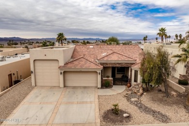 Take a look at this stunning RV garage home located in a private on London Bridge Golf Course in Arizona - for sale on GolfHomes.com, golf home, golf lot