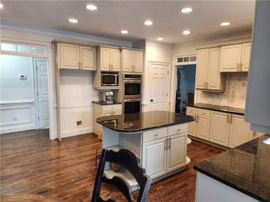 Welcome to this beautiful lakefront home located on a quiet on Brookstone Golf and Country Club in Georgia - for sale on GolfHomes.com, golf home, golf lot