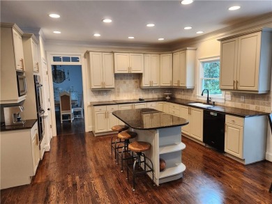 Welcome to this beautiful lakefront home located on a quiet on Brookstone Golf and Country Club in Georgia - for sale on GolfHomes.com, golf home, golf lot