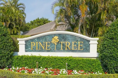 EXCLUSIVE Gated Pine Tree Golf Club living in this 4BR/3BA on Pine Tree Golf Club in Florida - for sale on GolfHomes.com, golf home, golf lot