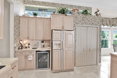 EXCLUSIVE Gated Pine Tree Golf Club living in this 4BR/3BA on Pine Tree Golf Club in Florida - for sale on GolfHomes.com, golf home, golf lot