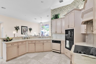 EXCLUSIVE Gated Pine Tree Golf Club living in this 4BR/3BA on Pine Tree Golf Club in Florida - for sale on GolfHomes.com, golf home, golf lot