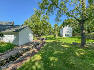 Stunning 6-bed, 5-bath farmhouse beautifully situated on almost on Valley Country Club in Pennsylvania - for sale on GolfHomes.com, golf home, golf lot