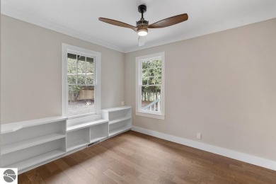 This brilliantly restored home delivers comfort, charm, and on Charlevoix Golf Club in Michigan - for sale on GolfHomes.com, golf home, golf lot