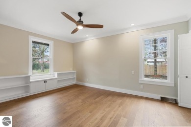 This brilliantly restored home delivers comfort, charm, and on Charlevoix Golf Club in Michigan - for sale on GolfHomes.com, golf home, golf lot