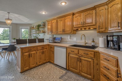 Immaculate Home with Golf Course Views in Loma Linda! This on The Bald Eagle Course At Eagle Creek Golf Club in Missouri - for sale on GolfHomes.com, golf home, golf lot